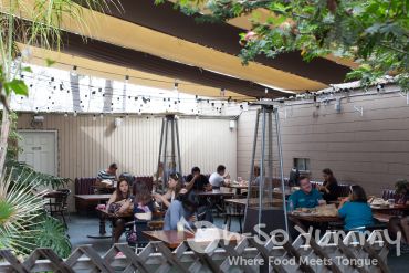 back patio seating at Evolution Fast Food in San Diego back patio seating at Evolution Fast Food in San Diego