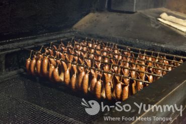 sausage on the grill at City Market in Luling Texas sausage on the grill at City Market in Luling Texas