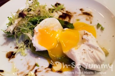 Asparagus with popped egg at La Coincidence in Paris France Asparagus with popped egg at La Coincidence in Paris France