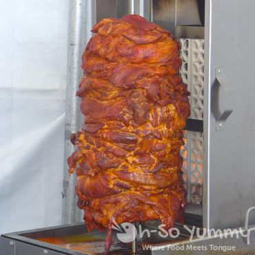 roasting meat by the taco stand at Harborfest Tacos and Spirits roasting meat by the taco stand at Harborfest Tacos and Spirits