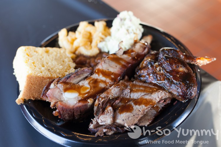 Three Meats and Three Sides Combo Plated at Sque BBQ Three Meats and Three Sides Combo Plated at Sque BBQ