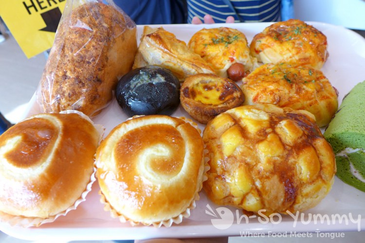 tons of bakery items on tray ready to be wrapped at 85C Bakery Cafe in San Diego tons of bakery items on tray ready to be wrapped at 85C Bakery Cafe in San Diego