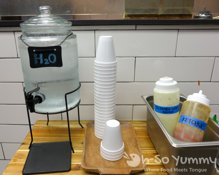 water and condiment station at Baguette Bros water and condiment station at Baguette Bros