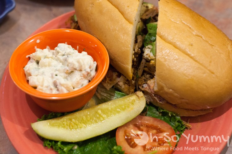 orange anchiote pulled pork at Crest Cafe in Hillcrest orange anchiote pulled pork at Crest Cafe in Hillcrest