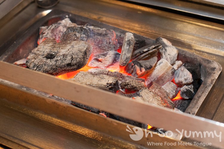 charcoal under grills at Dae Jang Keum charcoal under grills at Dae Jang Keum