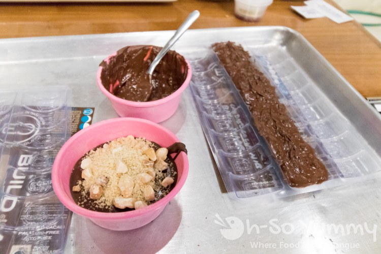 Chocolate molds and mix-ins at Eclipse Chocolate Build A Bar workshop Chocolate molds and mix-ins at Eclipse Chocolate Build A Bar workshop