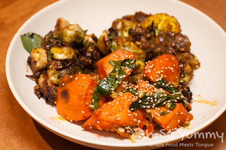 yuzu brussels sprouts, red chili glazed sweet potato, indian spiced cauliflower winter sunshine salad with salmon at Flower Child (Flower Hill Promenade) in Del Mar yuzu brussels sprouts, red chili glazed sweet potato, indian spiced cauliflower winter sunshine salad with salmon at Flower Child (Flower Hill Promenade) in Del Mar