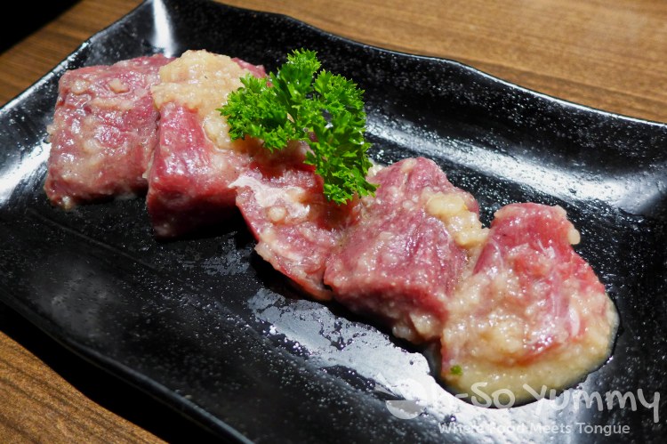 Gyu-Kaku Japanese BBQ - Filet Mignon with Garlic Gyu-Kaku Japanese BBQ - Filet Mignon with Garlic