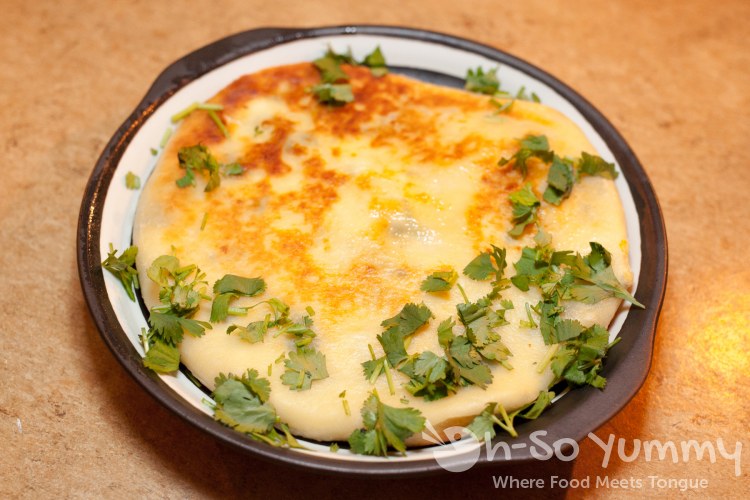 Khachapuri (cheese pie) at Kafe Sobaka Restoran Pomegranate Khachapuri (cheese pie) at Kafe Sobaka Restoran Pomegranate