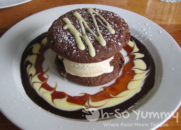 McCormick and Schmick's Two Soft Chocolate Cookies Sandwiched with Vanilla Ice Cream and Chocolate Sauce McCormick and Schmick's Two Soft Chocolate Cookies Sandwiched with Vanilla Ice Cream and Chocolate Sauce