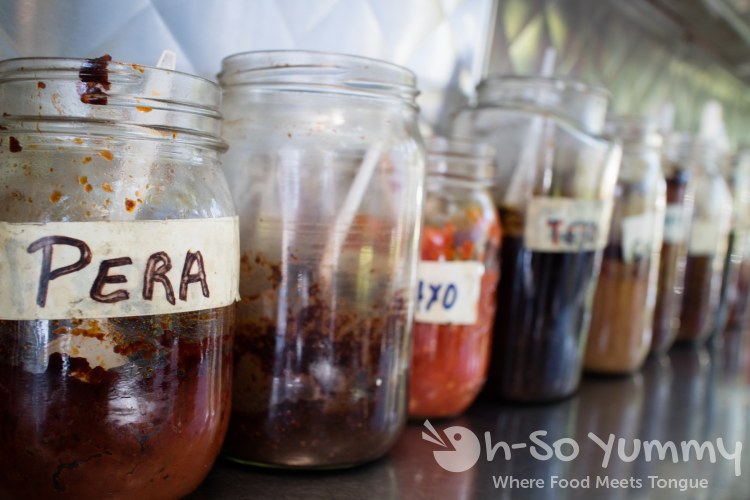 jars of sauces at Mariscos Ruben truck in Tijuana, B.C., Mexico jars of sauces at Mariscos Ruben truck in Tijuana, B.C., Mexico