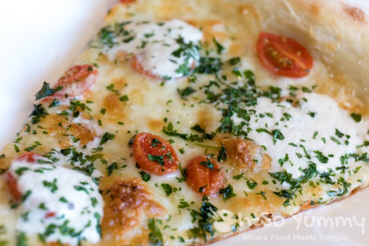 Mamma Moto pizza slice at Mr Moto Pizza in Point Loma Mamma Moto pizza slice at Mr Moto Pizza in Point Loma