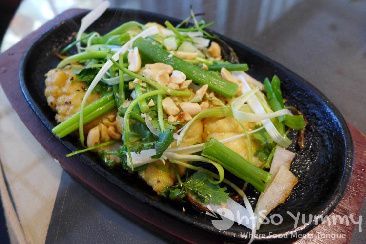 sizzling fish filet on hot plate at Nhu Y Ca 8 Mon sizzling fish filet on hot plate at Nhu Y Ca 8 Mon