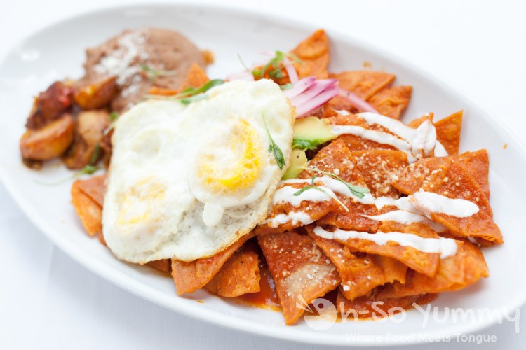 red chilaquilles at Romesco Mexiterranean Cocina in San Diego red chilaquilles at Romesco Mexiterranean Cocina in San Diego