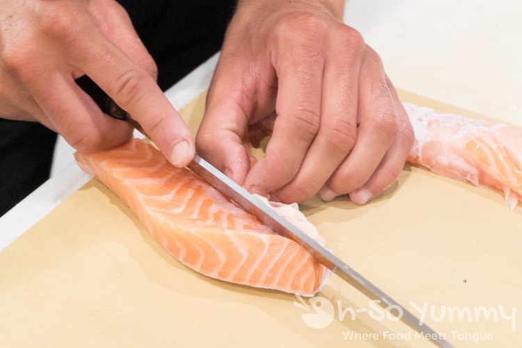 Salmon belly preparation at Single Fin Kitchen inside Atlas Market in Poway Salmon belly preparation at Single Fin Kitchen inside Atlas Market in Poway