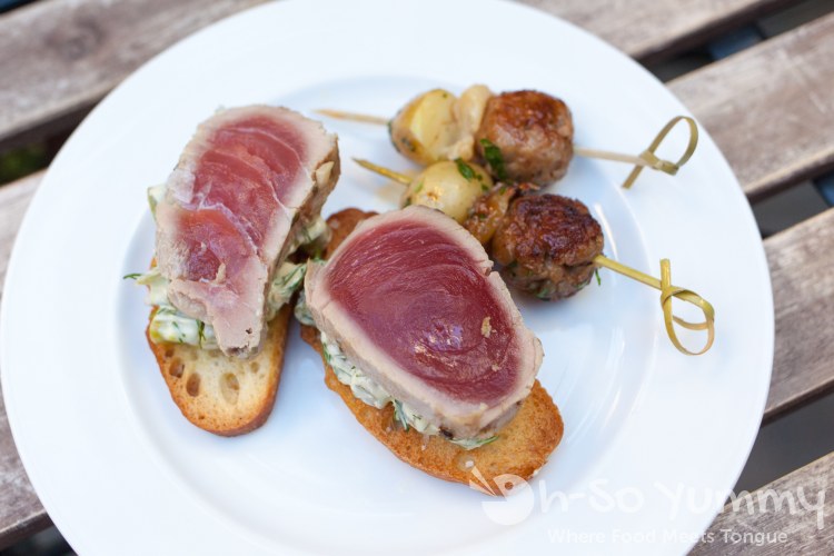 seared ahi crostini, sausage and spicy potatoes seared ahi crostini, sausage and spicy potatoes