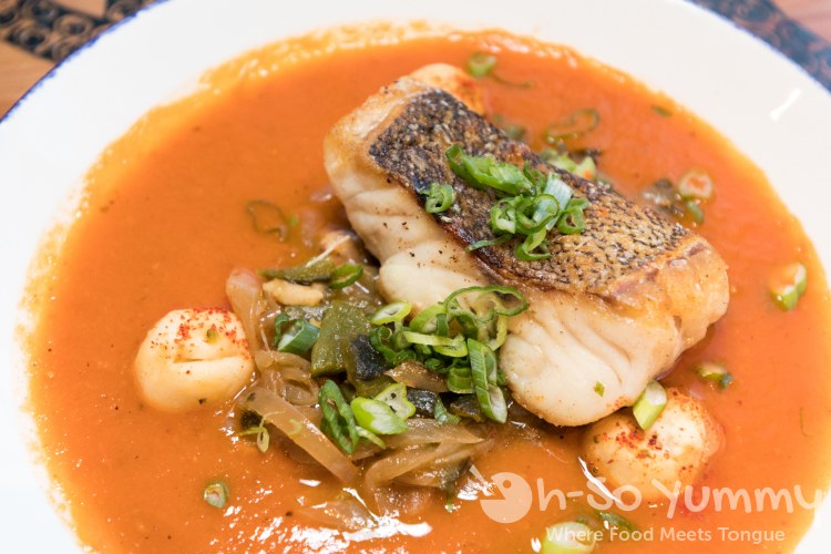 Sea Bass in smoked tomato broth at Waterbar in Pacific Beach of San Diego Sea Bass in smoked tomato broth at Waterbar in Pacific Beach of San Diego