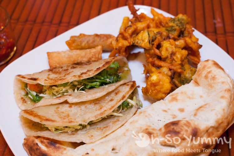 tikka taco, vegetable pakora, phall popper, naan at World Curry in Pacific Beach tikka taco, vegetable pakora, phall popper, naan at World Curry in Pacific Beach