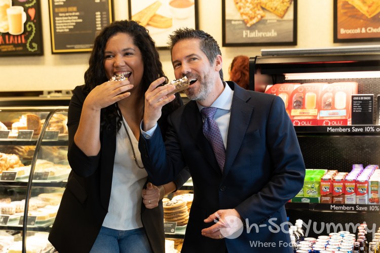 Jessica McGehee and Neil Strong taking a cookie bite Jessica McGehee and Neil Strong taking a cookie bite