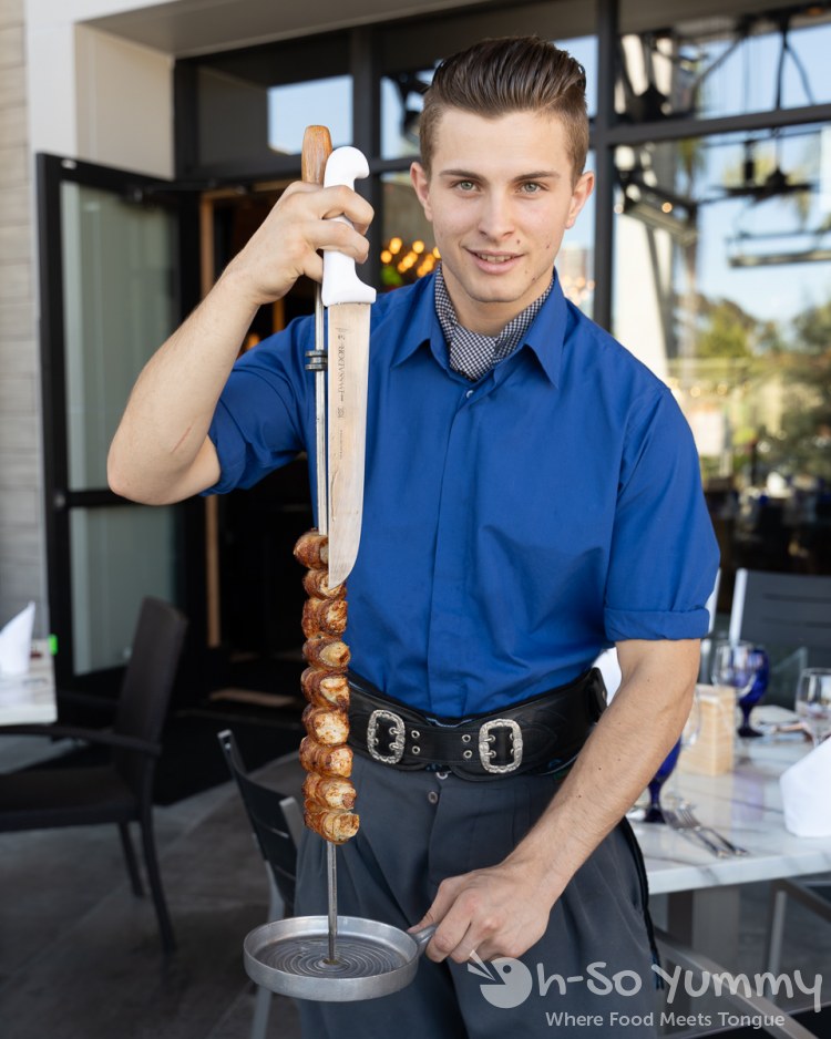meat served from a skewer at Texas de Brazil churrascaria in The Shoppes at Carlsbad meat served from a skewer at Texas de Brazil churrascaria in The Shoppes at Carlsbad