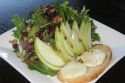 Warm Goat Cheese Salad with Crostini, Spring Mix, Apple, Walnut & Peppered Honey